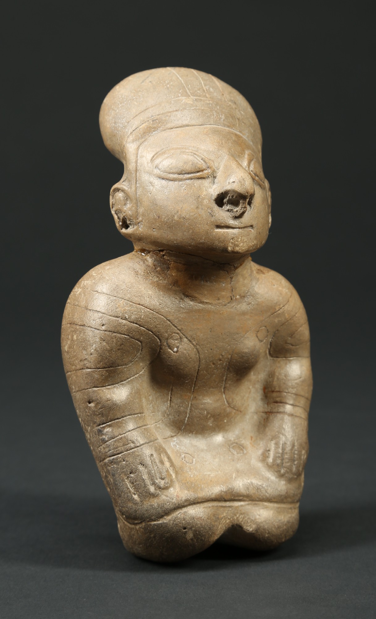 PC420: Guangala sitting figure
