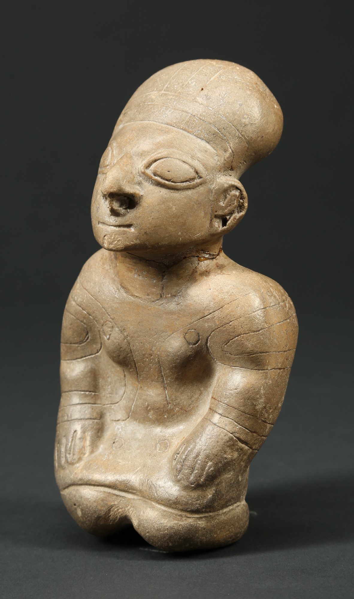 PC420: Guangala sitting figure
